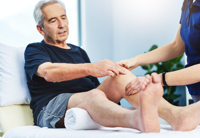 Cropped shot of a physiotherapist assisting a senior patient in recovery